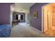Large bedroom providing a versatile space with a desk, built-in shelving, and an ensuite bathroom at 1226 Rising Oak Dr, Charlotte, NC 28206