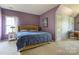Spacious bedroom with a window, plush carpeting and a walk-in closet with ample storage at 1226 Rising Oak Dr, Charlotte, NC 28206