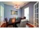 Stylish dining area with modern chairs and a window for natural light at 1226 Rising Oak Dr, Charlotte, NC 28206