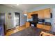 Bright kitchen with stainless steel appliances and hardwood flooring, door leading to outside at 1226 Rising Oak Dr, Charlotte, NC 28206