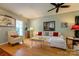 Cozy living room featuring a comfortable white sofa and stylish decor at 1226 Rising Oak Dr, Charlotte, NC 28206