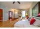 Bright living area with hardwood floors and an open doorway to the dining room at 1226 Rising Oak Dr, Charlotte, NC 28206