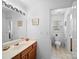Bathroom with a sink, a vanity, and a toilet at 12415 Stratfield Place Cir, Pineville, NC 28134