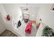 View of the living room with a red sofa, chair, and a ceiling fan at 12415 Stratfield Place Cir, Pineville, NC 28134