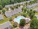 Aerial view of the community pool and surrounding green space at 12415 Stratfield Place Cir, Pineville, NC 28134