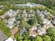 Aerial view of a neighborhood with mature trees and well-maintained homes, near the local school at 138 Blandina Ct, Fort Mill, SC 29708