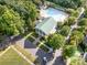 Aerial view of community pool area with lush trees and well-manicured landscaping at 138 Blandina Ct, Fort Mill, SC 29708
