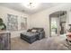 Cozy bedroom with neutral tones, plush seating, and lots of natural light at 138 Blandina Ct, Fort Mill, SC 29708