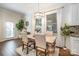 Charming dining room featuring a rustic table, ample natural light, and stylish decor at 138 Blandina Ct, Fort Mill, SC 29708