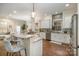 Bright kitchen with granite countertops, stainless steel appliances and eat-in bar seating at 138 Blandina Ct, Fort Mill, SC 29708