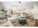 Open-concept living room showcasing elegant furniture and a seamless flow into the modern kitchen at 138 Blandina Ct, Fort Mill, SC 29708