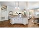 Open floor plan with the living area flowing into a well-lit kitchen and dining space at 138 Blandina Ct, Fort Mill, SC 29708