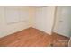 Serene bedroom with wood flooring and ample closet space at 1409 Turner Dr, Gastonia, NC 28052