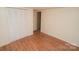 Comfortable bedroom with hardwood floors, closet, and natural light at 1409 Turner Dr, Gastonia, NC 28052