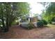 Charming single-story home with a screened-in porch and nicely landscaped yard at 1409 Turner Dr, Gastonia, NC 28052