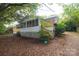 Charming single-story home with a screened-in porch and nicely landscaped yard at 1409 Turner Dr, Gastonia, NC 28052