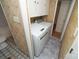 Laundry room featuring a full-sized washer and dryer and tile floor at 1409 Turner Dr, Gastonia, NC 28052