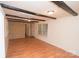 Spacious living room with hardwood floors and exposed beams, ready for personalization at 1409 Turner Dr, Gastonia, NC 28052