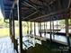 Inside boat house view of lake and boat lift at 143 Uwharrie Ct # 10801081, Mount Gilead, NC 27306