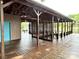 Covered boat house with wooden beams and water access at 143 Uwharrie Ct # 10801081, Mount Gilead, NC 27306