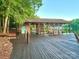 Wooden dock with covered seating area and lake access at 143 Uwharrie Ct # 10801081, Mount Gilead, NC 27306