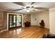 Living room featuring beautiful hardwood floors and wooden accent wall at 143 Uwharrie Ct # 10801081, Mount Gilead, NC 27306