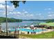 Community pool with lake view perfect for relaxation at 143 Uwharrie Ct # 10801081, Mount Gilead, NC 27306