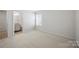 Large bedroom with carpet, a window, and ensuite bathroom at 15119 Oleander Dr, Charlotte, NC 28278