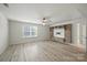 This open living room is filled with light, and has a built in entertainment center with lots of storage at 15119 Oleander Dr, Charlotte, NC 28278
