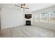 Bright living room includes a fireplace and large windows for natural light at 15119 Oleander Dr, Charlotte, NC 28278