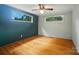 Bright bedroom with hardwood floors and good natural light, offering a welcoming and comfortable living space at 1535 Maplewood Ave, Lancaster, SC 29720