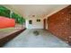 Functional covered carport with brick and white exterior provides convenient parking at 1535 Maplewood Ave, Lancaster, SC 29720
