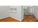 Well-designed kitchen features stainless steel appliances, a breakfast bar, and ample cabinet space, perfect for culinary enthusiasts at 1535 Maplewood Ave, Lancaster, SC 29720