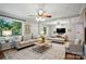 Cozy living room featuring gray walls, stylish furniture, recessed lighting, and ample space for relaxation and entertainment at 1535 Maplewood Ave, Lancaster, SC 29720