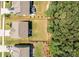 Aerial view showcasing the home's layout, the lot size, surrounding landscape, and the property's location within the neighborhood at 169 Rooster Tail Ln, Troutman, NC 28166
