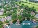 Luxury home with boat slip and dock access in a beautiful community, as seen from an aerial view at 19205 Hidden Cove Ln, Cornelius, NC 28031