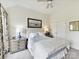 Comfortable bedroom with a queen bed, soft lighting, and soothing decor create a relaxing atmosphere at 19205 Hidden Cove Ln, Cornelius, NC 28031