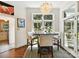 Breakfast nook featuring seating for four, a modern chandelier and patio access at 19205 Hidden Cove Ln, Cornelius, NC 28031