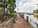 Long dock extending into the lake, perfect for boating and enjoying the waterfront lifestyle at 19205 Hidden Cove Ln, Cornelius, NC 28031