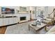 Cozy living room with a fireplace, TV, and elegant furnishings at 19205 Hidden Cove Ln, Cornelius, NC 28031