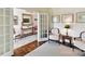 Cozy office space featuring French doors and a view of the foyer at 19205 Hidden Cove Ln, Cornelius, NC 28031