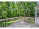 Enjoy a wooded view from the home's back deck at 203 Hickory Wood Dr, Kannapolis, NC 28083