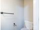 Bathroom featuring a toilet with a towel bar and toilet paper holder at 203 Hickory Wood Dr, Kannapolis, NC 28083