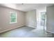 Neutral bedroom featuring a window allowing light to filter through at 203 Hickory Wood Dr, Kannapolis, NC 28083