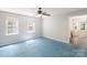 Cozy bedroom featuring natural light from two windows and ceiling fan at 203 Hickory Wood Dr, Kannapolis, NC 28083