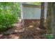 The back of the house features siding and brick foundation at 203 Hickory Wood Dr, Kannapolis, NC 28083