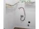 Bright laundry area features modern connections and convenient shelving for organized storage at 203 Hickory Wood Dr, Kannapolis, NC 28083