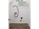 Laundry room featuring white walls and brown wood-look flooring at 203 Hickory Wood Dr, Kannapolis, NC 28083