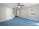 Bright living room features natural light, stairs, and direct outdoor access at 203 Hickory Wood Dr, Kannapolis, NC 28083