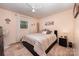 Comfortable bedroom with neutral tones, a ceiling fan, and natural light at 2109 Quail Nw Dr, Concord, NC 28027